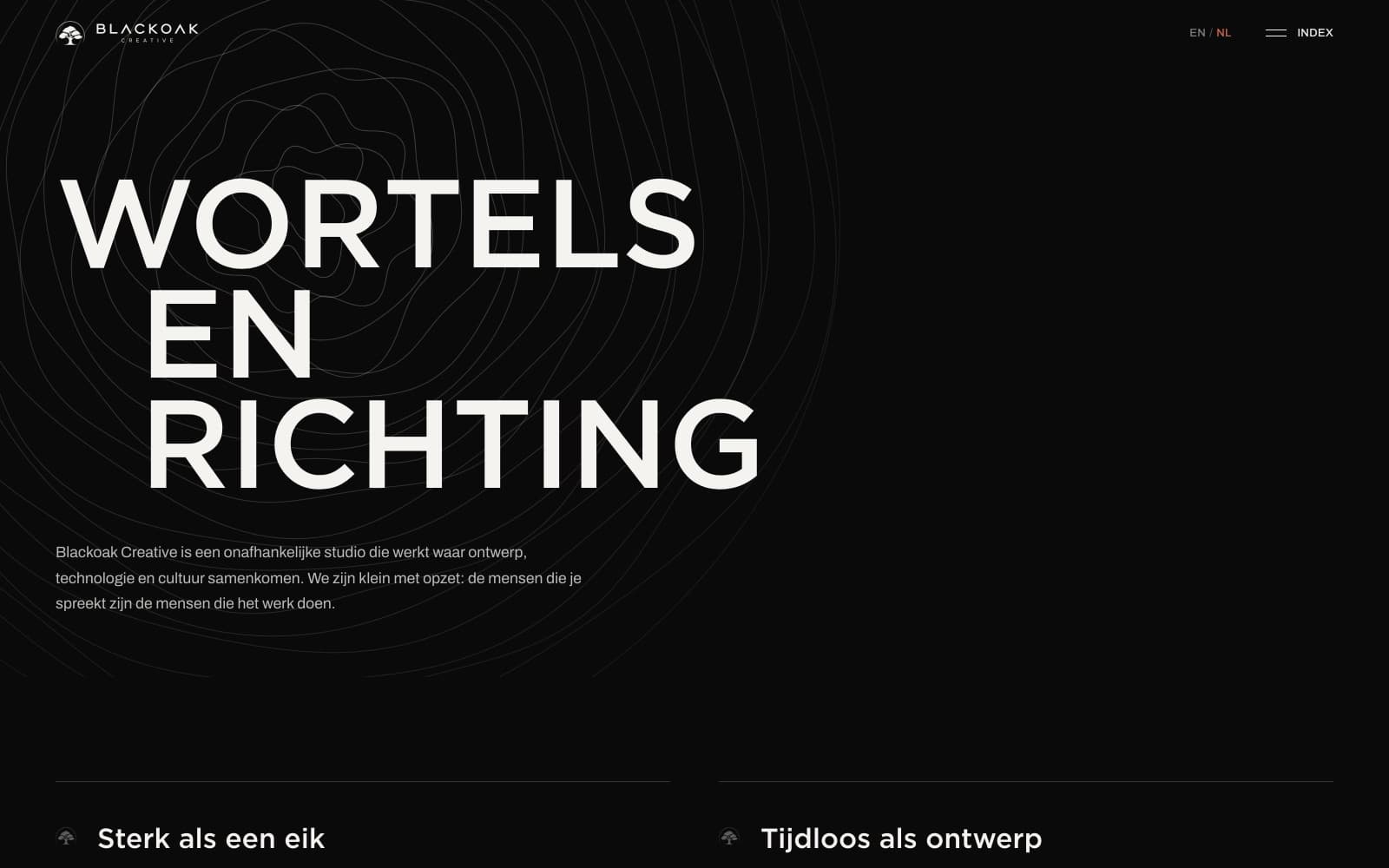 Blackoak Creative studio page: “Wortels en richting” in off-white over faint concentric growth rings, with the studio statement in Dutch beneath